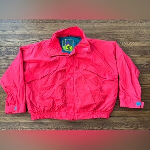 vintage 1980s or 1990s red and teal windbreaker features a Steep Slopes Fashion